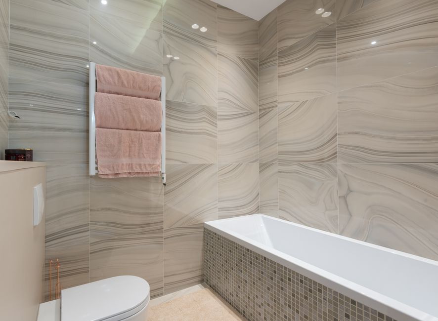 Detailed ceramic tile installation in a bathroom